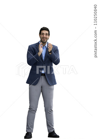 A man in a jacket on a White background claps his hands 110250840