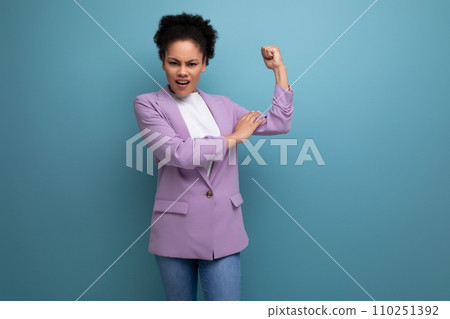 young stylish successful hispanic business woman with ponytail dressed in a jacket young stylish successful hispanic business woman with ponytail dressed in a jacket 110251392