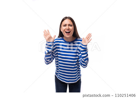 young groovy cheerful caucasian woman with dark hair dressed in a blue striped sweatshirt on a white young groovy cheerful caucasian woman with dark hair dressed in a blue striped sweatshirt on a white 110251406