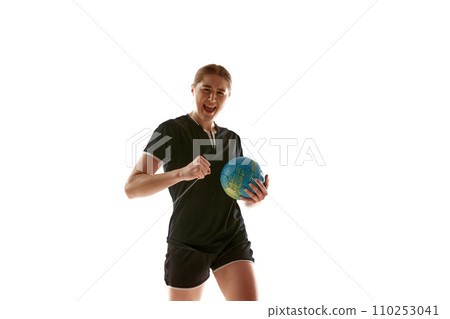 Young woman, professional handball athlete happy because she scored perfect decisive goal against opponent against white background. Young woman, professional handball athlete happy because she scored perfect decisive goal against opponent against white background. 110253041