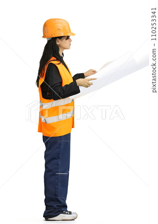 A construction girl on a green background, full-length, with drawings 110253341