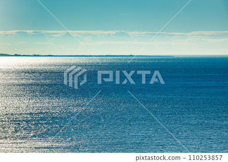 Majestic beautiful white clouds and the calm azure sea background wallpaper. Majestic beautiful white clouds and the calm azure sea background wallpaper. 110253857