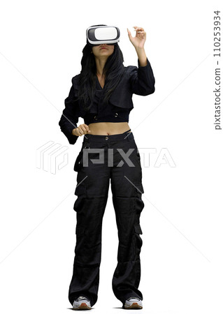 A woman in black clothes, on a white background, full-length, wearing VR glasses A woman in black clothes, on a white background, full-length, wearing VR glasses 110253934