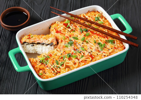 sushi bake with salmon, rice, seaweed, crab meat 110254348