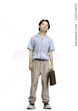 A guy in a blue shirt, on a white background, full-length, with a briefcase 110254474