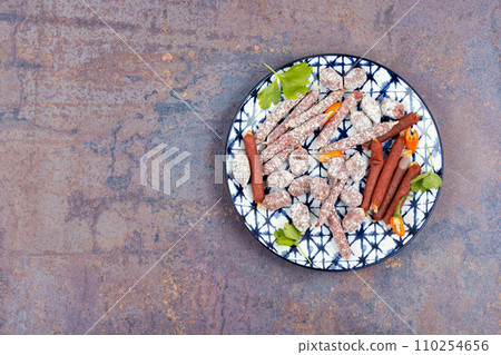 Tasty salami on a plate 110254656