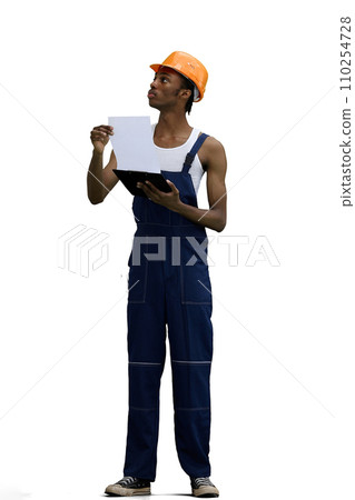 A male construction worker, on a white background, in full height, looking up A male construction worker, on a white background, in full height, looking up 110254728