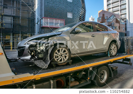 Accident car being towed away Accident car being towed away 110254882