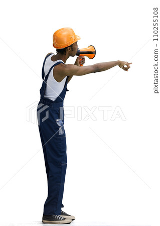 A male construction worker, on a white background, in full height, with a megaphone 110255108