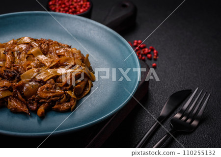 Delicious asian udon dish with vegetables, mushrooms, salt and spices Delicious asian udon dish with vegetables, mushrooms, salt and spices 110255132