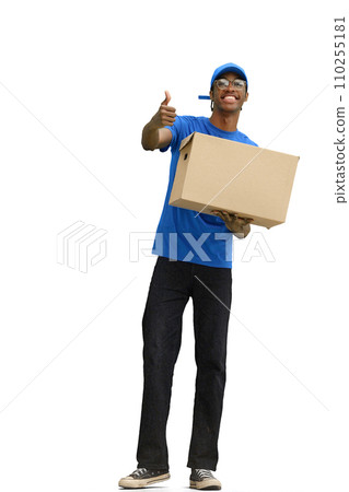 A male deliveryman, on a white background, full-length, with a box 110255181