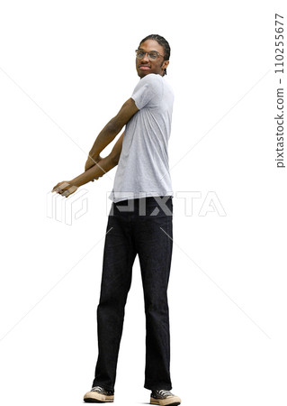 A man in a gray T-shirt, on a white background, in full height, warming up 110255677