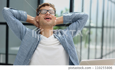 Successful hispanic man resting in office relaxing, businessman meditating in lotus position Successful hispanic man resting in office relaxing, businessman meditating in lotus position 110255806
