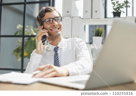 Man accountant or business lawyer talking on smartphone Man accountant or business lawyer talking on smartphone 110255816