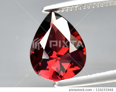 natural red garnet gem on the background 110255948