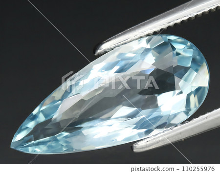 natural blue aquamarine gem on the background 110255976