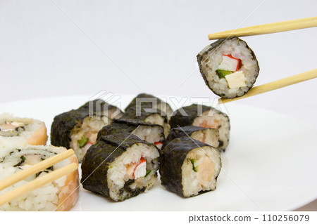 Japanese cuisine, rice sushi and fish - closeup 110256079