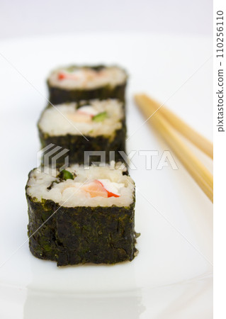 Japanese cuisine, rice sushi and fish - closeup 110256110