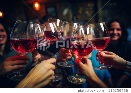 Glasses of wine in hands while toasting 110259466