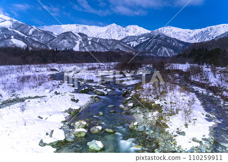 [Nagano Prefecture] Snowy Northern Alps and Matsukawa clear stream, Hakuba Village in winter 110259911
