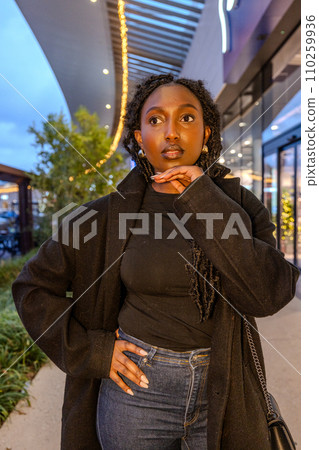 Pensive Gaze Amidst City Lights 110259936