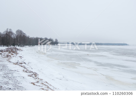 Frosty sea in winter, full of snow. 110260306