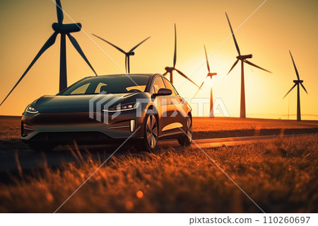 Electric Car in field with Wind turbines. EV electric car in Eolic park windpower. 110260697