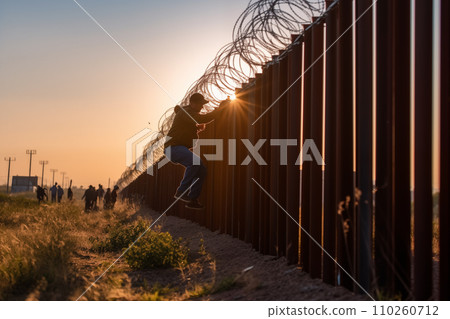 Refugees crossing border. Migrants cross border illegally. 110260712