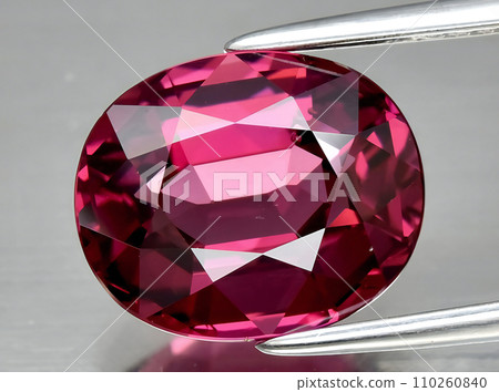 natural red rhodolite garnet gem on the background 110260840