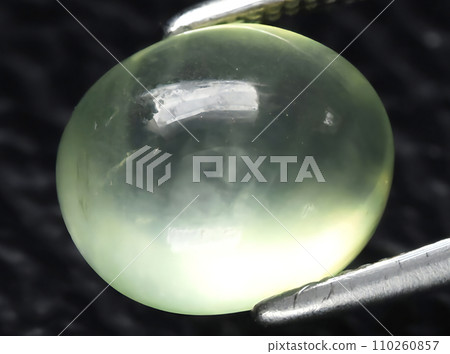 natural green prehnite gem on the background natural green prehnite gem on the background 110260857