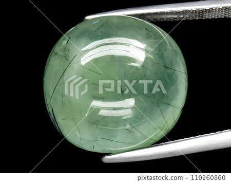 natural green prehnite gem on the background natural green prehnite gem on the background 110260860