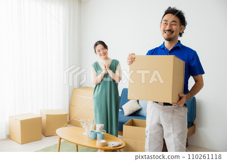 A woman preparing to move A woman preparing to move 110261118