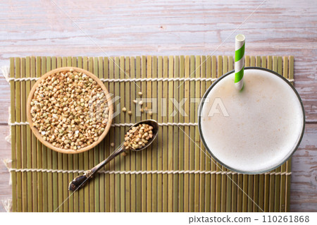Vegan Buckwheat milk and buckwheat groats.Non dairy alternative milk. Healthy vegetarian food and drink concept.Top view 110261868