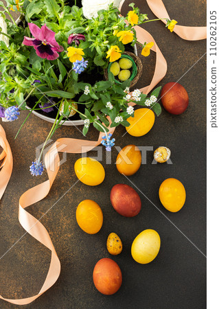 Blooming flowers and Easter eggs 110262105