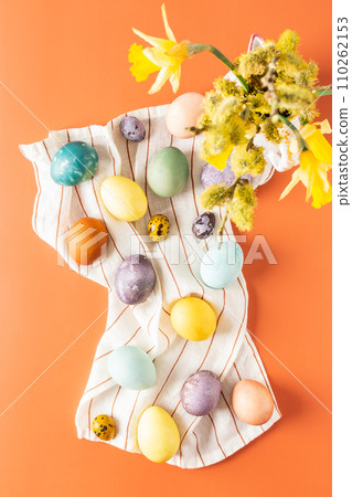 Naturally dyed Easter eggs on a napkin Naturally dyed Easter eggs on a napkin 110262153