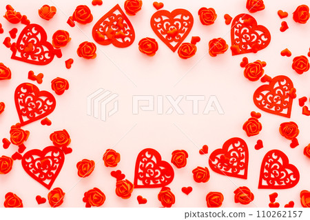 Red flowers and hearts on a pink background 110262157