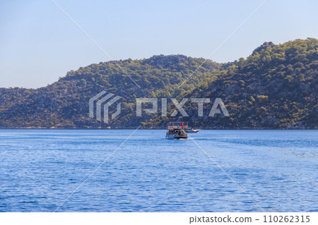 Tourist ship sailing in the Mediterranean sea near Kekova island in Antalya province, Turkey. Turkish Riviera 110262315