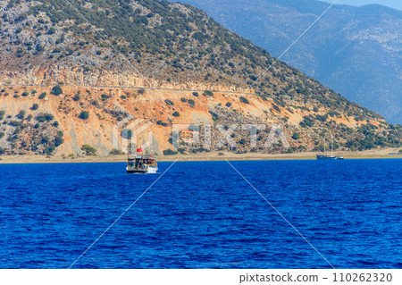Tourist ship sailing in the Mediterranean sea near Kekova island in Antalya province, Turkey. Turkish Riviera 110262320