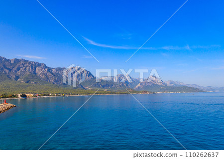 View of the Mediterranean sea coast and the Taurus mountains in Kemer, Antalya province in Turkey 110262637