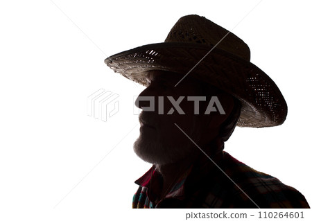 Old man in cowboy hat, side view - dark close-up silhouette Old man in cowboy hat, side view - dark close-up silhouette 110264601