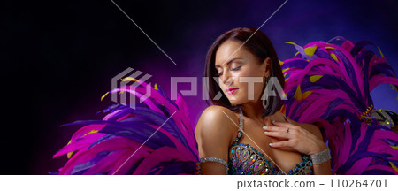 Beautiful girl in carnival costume. 110264701