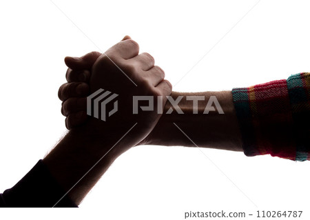 The outstretched hands of young and elderly men, help - silhouette The outstretched hands of young and elderly men, help - silhouette 110264787