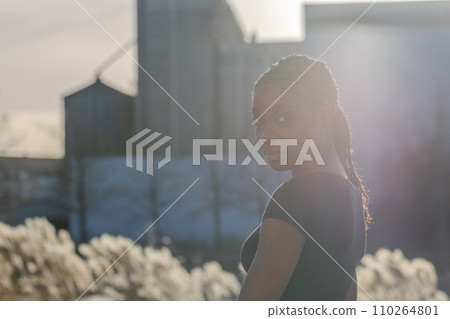 City Glow: Sunset Ambiance and Urban Dreams 110264801