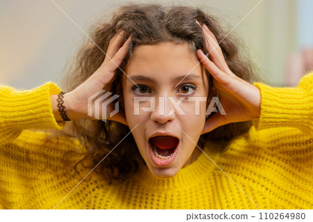 Excited girl child kid surprised, shocked by sudden victory good win news, celebrating, wow reaction Excited girl child kid surprised, shocked by sudden victory good win news, celebrating, wow reaction 110264980