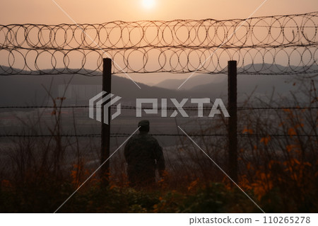 Border of South Kore and North Korea. Border with barbed wire on fence. 110265278