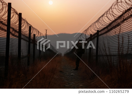 Border of South Kore and North Korea. Border with barbed wire on fence. Border of South Kore and North Korea. Border with barbed wire on fence. 110265279