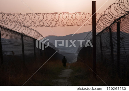 Border of South Kore and North Korea. Border with barbed wire on fence. 110265280