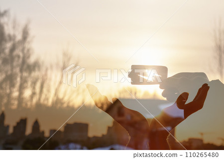 Hands sun sunset support protection. 110265480