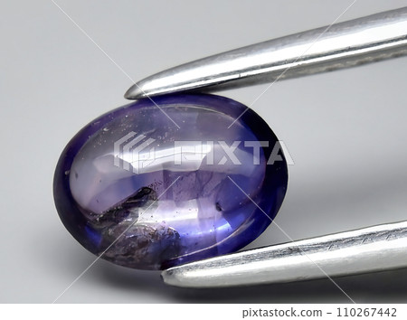 natural blue sapphire gem on the background 110267442
