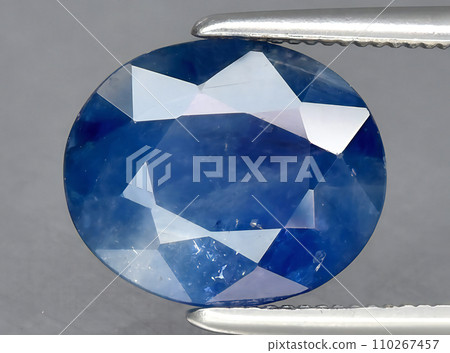 natural blue sapphire gem on the background 110267457